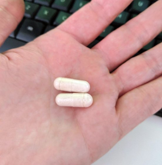Folexin capsules in hand for my folexin review
